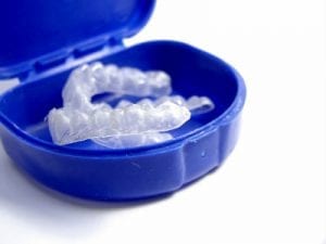 image of teeth whitening trays inside a blue container